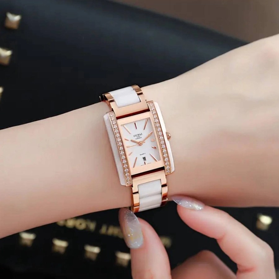 Watches 31- Oupai rectangular dial with stainless steel and white ceramic strap, Women's calendar display, quartz fashionable and minimalist Women's watch
$35